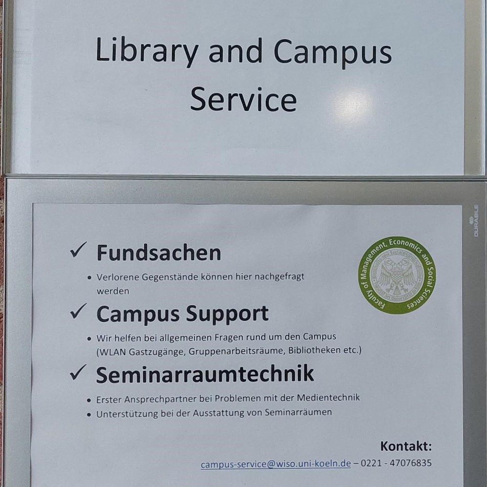 Schild mit Text: Library and Campus Service.